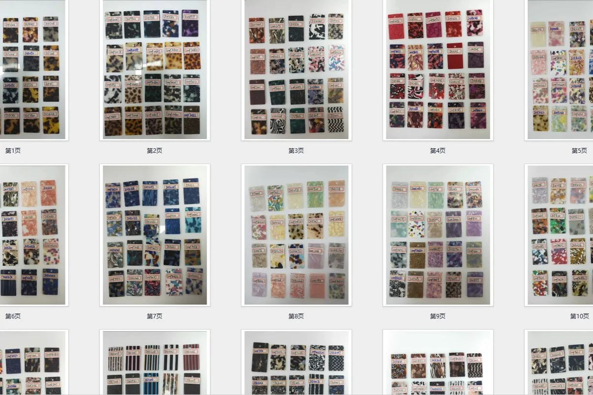Cellulose acetate sheet samples in various colours and patterns including tortoiseshell, marble, and translucent tints used for comb production