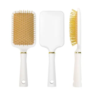 Pristine White Paddle Hair Brush with Electroplated Gold Bristles and Perforated Handle Base