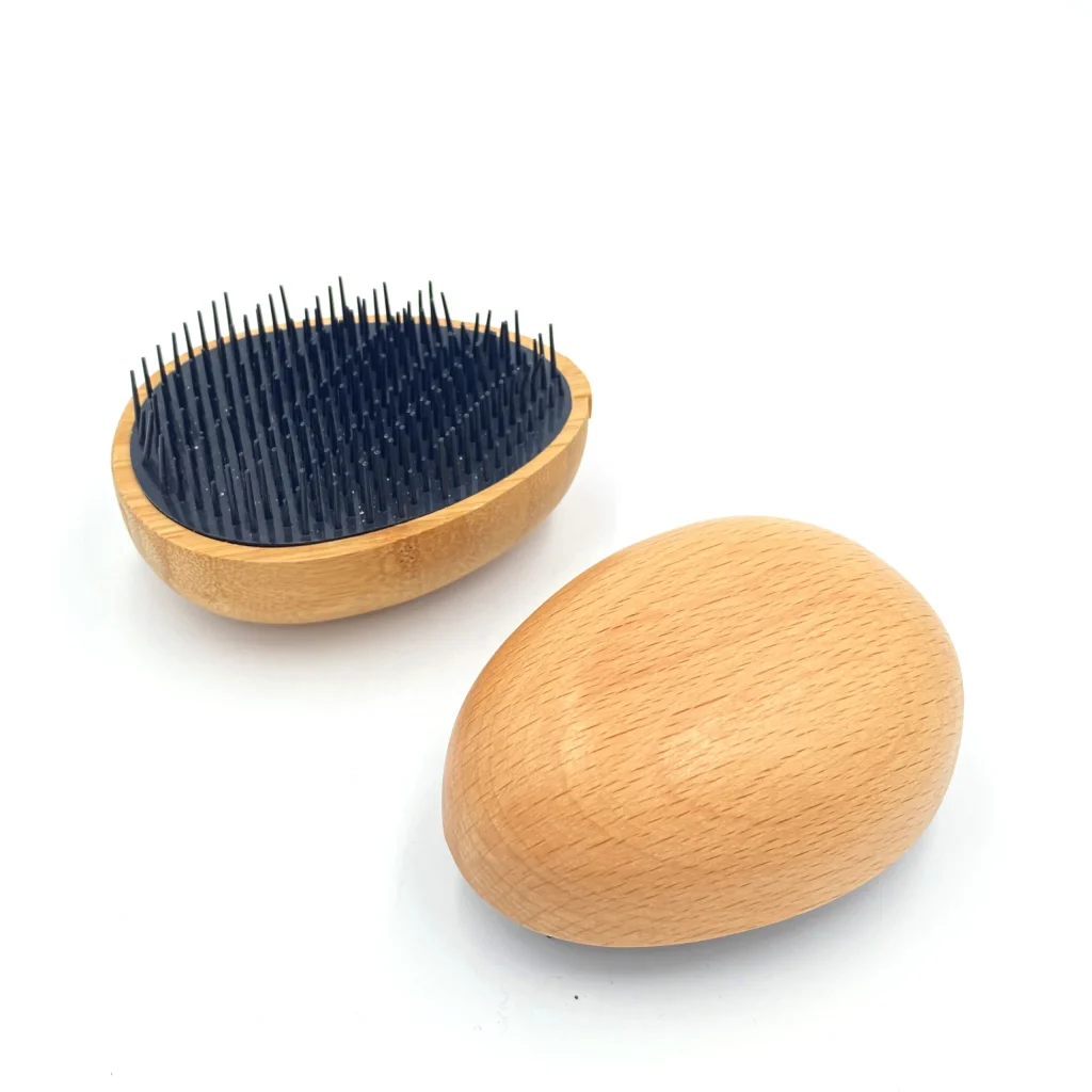 Portable Wooden Egg-Shaped Detangling Comb with Massaging Bristles
