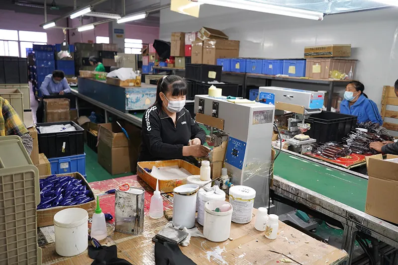 OEM claw clip production line at a China manufacturing facility showing organised bulk production of hair accessories
