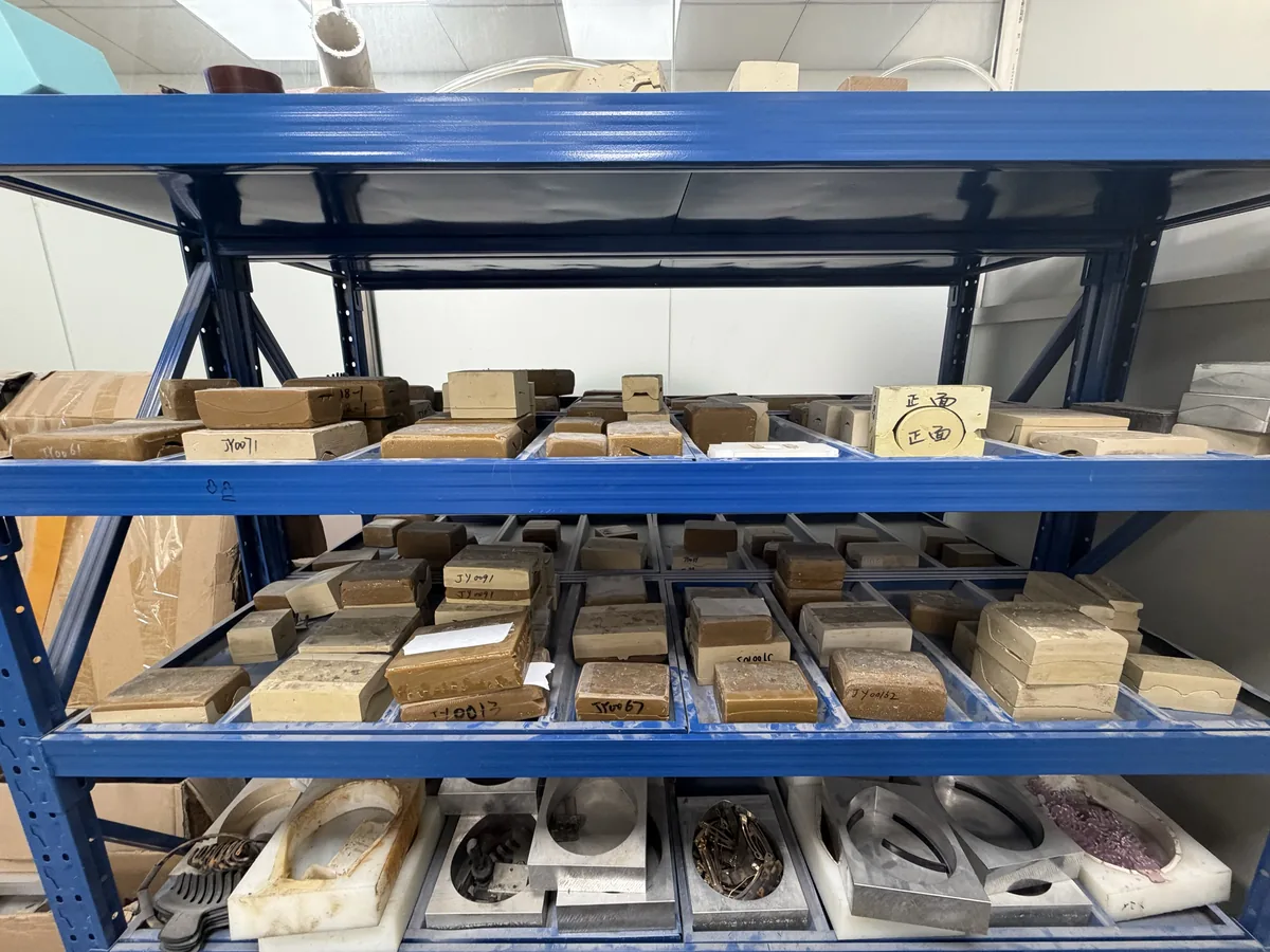 Shelves of existing cutting dies and shape fixtures for acetate hair clips and claw clips